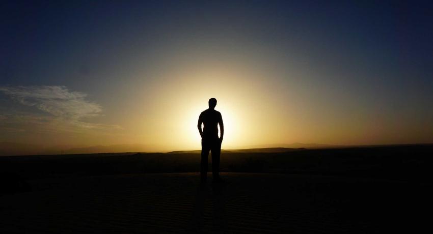 Man alone in desert